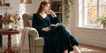 Model wearing the SlesSic DS077 dark emerald velvet nightgown with black lace neckline, ribbon tie, and long sleeves