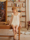 Romantic white viscose lounge set styled in elegant vintage interior