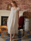 Soft flowy white lounge dress with feminine layered ruffle hem