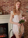 Soft blush pink vintage pajama set with delicate layered ruffle shorts