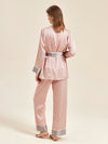 Back view of pink luxury pajama robe set with satin waist tie