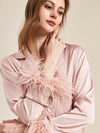 Close up of feather cuff satin pajama top detail