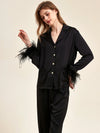 Feminine silky pajama set with soft feather accents