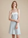 Women's soft blue satin slip dress with rhinestone trim detail