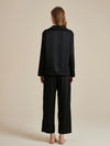 Back view of luxury black satin pajama set for women
