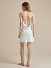 Back view of white satin open back slip dress with crossed straps
