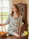 Women's boutique satin sleepwear set with playful retro print
