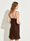 Back view of chocolate brown satin slip dress with adjustable straps