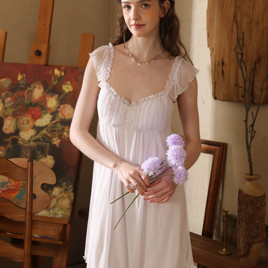 Slessic feminine sheer sleep dress with flutter sleeves and soft flowing silhouette for elegant bedtime comfort