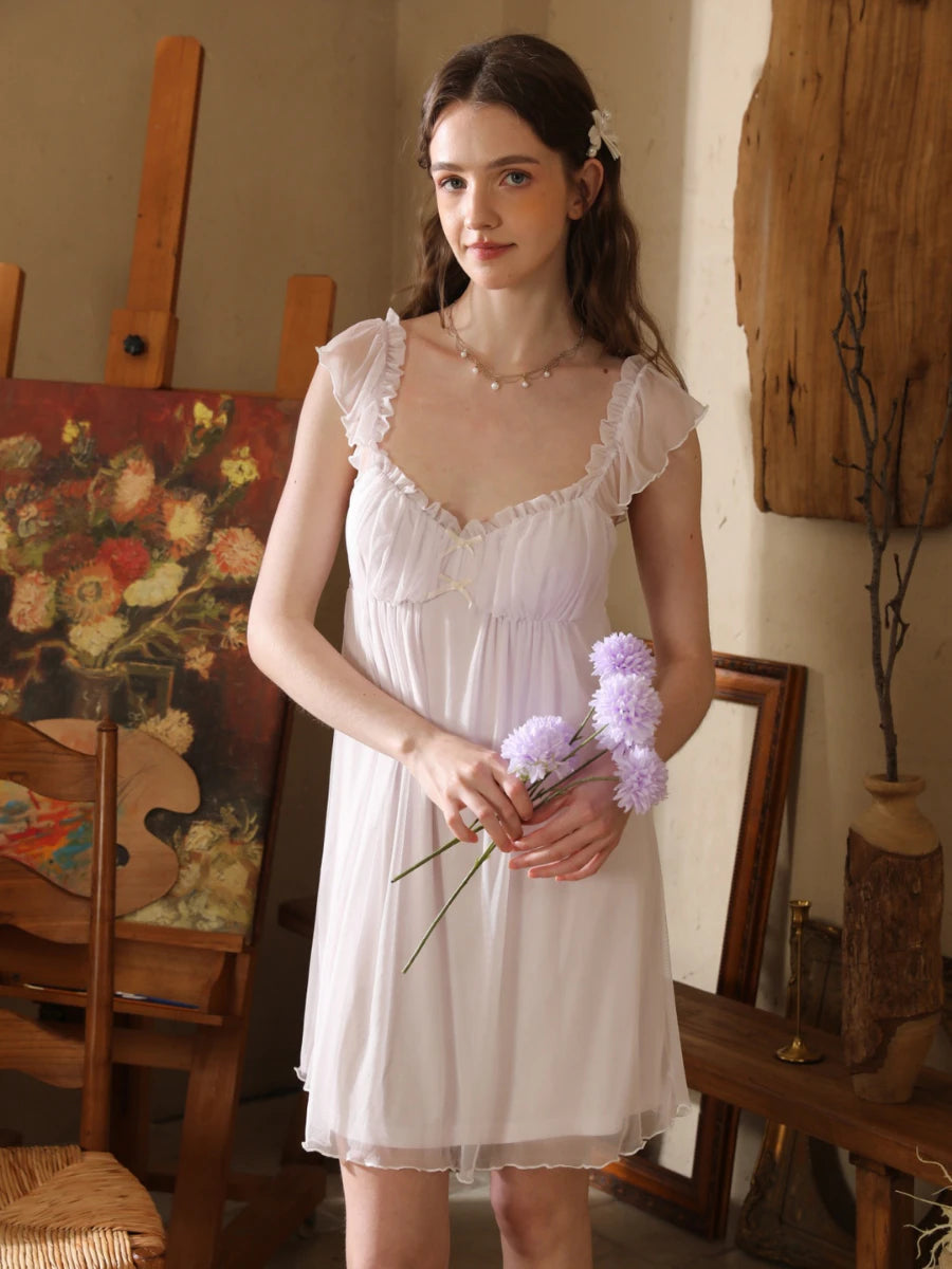 Slessic feminine sheer sleep dress with flutter sleeves and soft flowing silhouette for elegant bedtime comfort