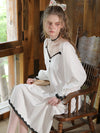 Elegant embroidered nightgown with contrast color trim