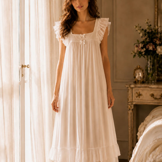 Close-up of SlesSic sleeveless sleep dress with feminine ruffle straps and bow detail