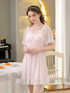 Pink lace nightdress with bow neckline and ruffled hem
