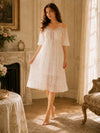 Feminine ivory mesh nightdress with flowing romantic silhouette
