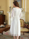 Back view of white flowing lace nightgown with soft mesh hem