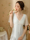 Soft light blue lounge dress with delicate lace trim and sheer short sleeves