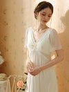 Feminine vintage inspired lounge dress with lace V-neck detail
