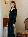 Side view of flowing emerald velvet lounge nightdress with ruffle hem