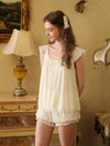 Slessic romantic ivory mesh pajama set with ruffle trim and airy layered shorts in vintage bedroom
