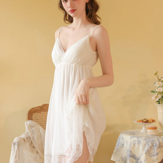 White lace trim cami nightdress with soft V neckline and flowing mini silhouette