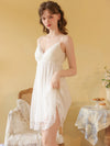 White lace trim cami nightdress with soft V neckline and flowing mini silhouette