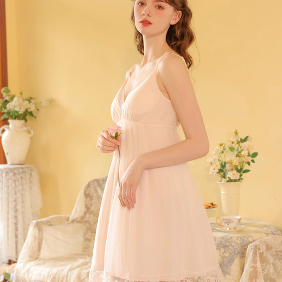Light pink lace trim slip nightdress with soft A-line silhouette