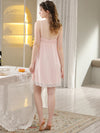 Pink cami nightdress hem detail with scalloped lace trim