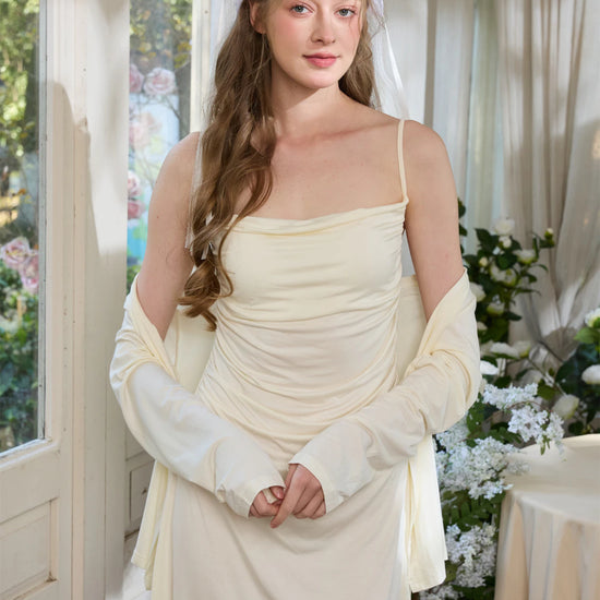 Light yellow slip nightdress with soft cardigan and relaxed feminine styling