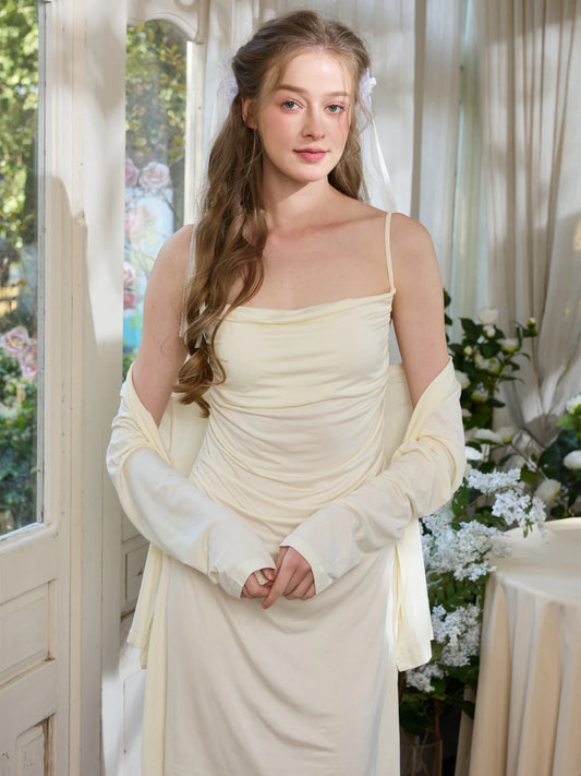 Light yellow slip nightdress with soft cardigan and relaxed feminine styling