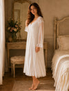 Side view of white sheer lace robe and flowing slip nightgown