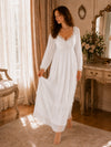 White romantic lace nightgown with long sleeves and airy layered hem