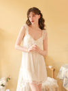 Front view of the white cami nightdress highlighting its gathered V neckline and embroidered mesh