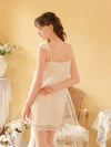 Back view of the white floral mesh nightdress showing slender adjustable straps and soft drape