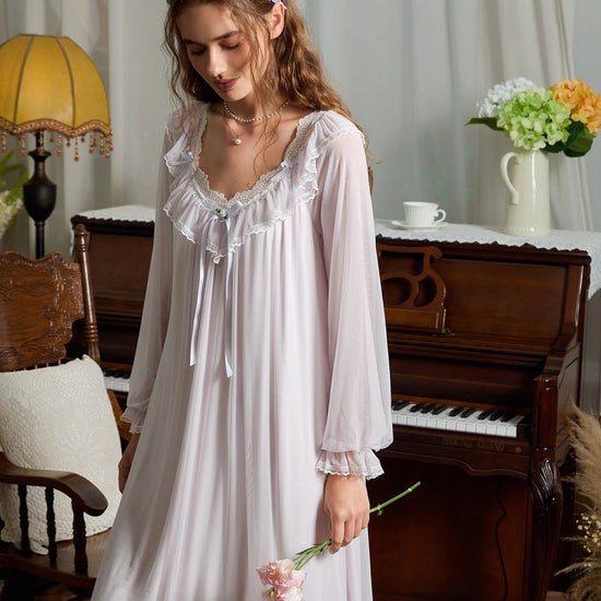 Closer angled view of the light purple nightgown showing the scalloped lace neckline, layered mesh ruffles, and gathered cuffs