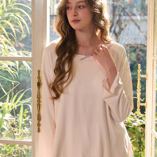 Light pink pajama set with bow neckline and soft viscose drape