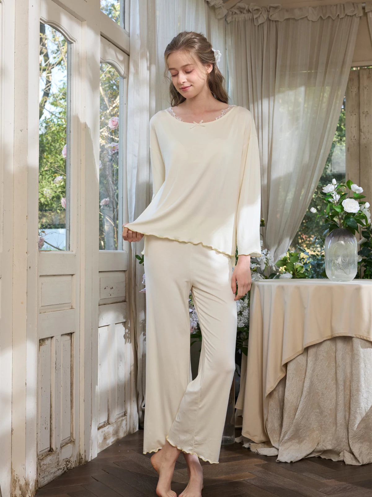 Light yellow long sleeve pajama set with relaxed silhouette for lounging