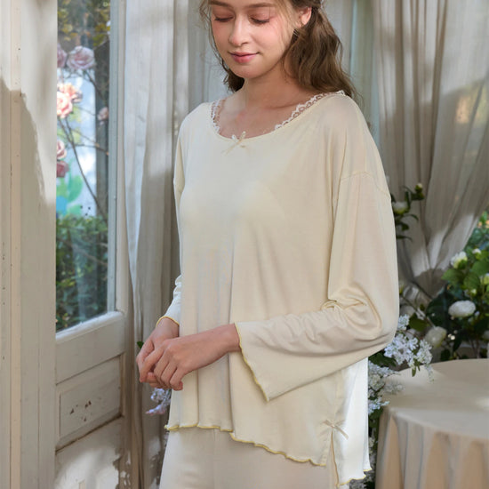 Light yellow viscose pajama set with soft drape and delicate trim