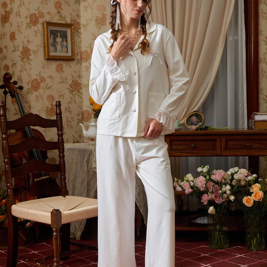 White ruffle lace button-down pajama set shown in a full front view with long sleeves and pants