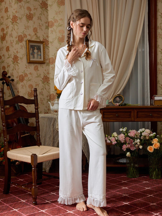 White ruffle lace button-down pajama set shown in a full front view with long sleeves and pants