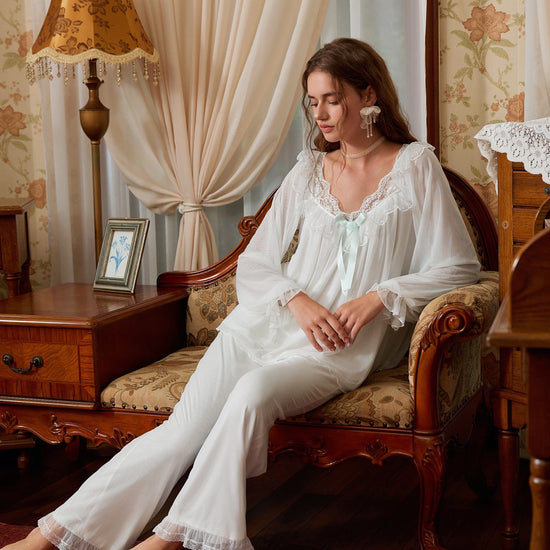 White sheer lace ruffle pajama set shown from the front with long sleeves and full-length pants