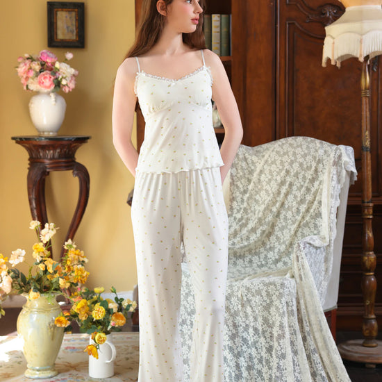 Full-length white floral pajama set view showing the soft cardigan and flowing pants