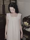 Model wearing SlesSic DS026 ivory ruffle-trim nightgown, showing the front, side, back neckline and natural drape