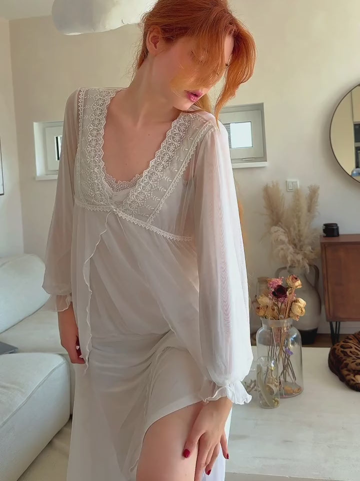Model wearing SlesSic DS058 ivory lace-trim robe and slip nightgown set, showing the V-neckline, sheer sleeves, side fit and flowing skirt